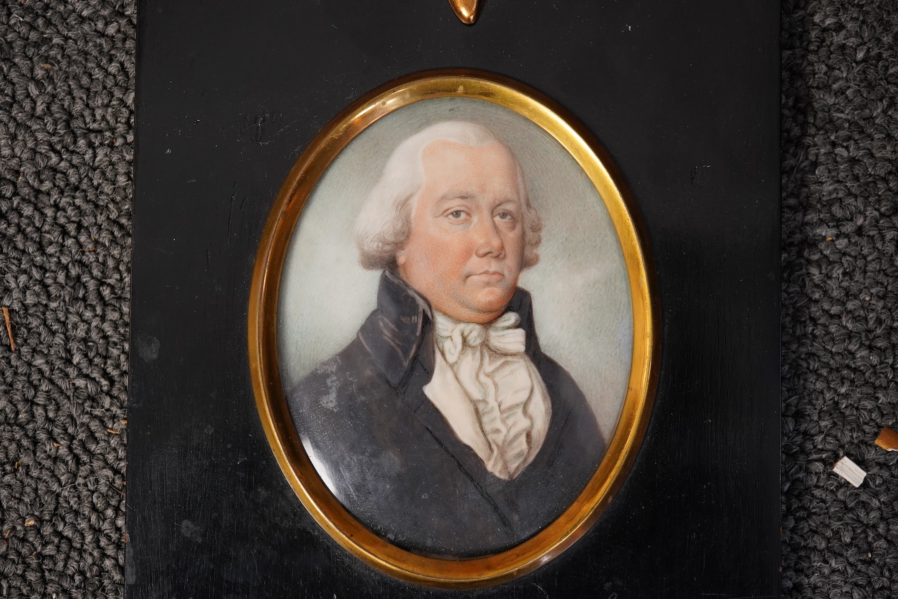 Thomas Hazlehurst (English, 1740-1821), Miniature portrait of a gentleman wearing a powdered wig, black coat and white stock, watercolour on ivory, 8.5 x 6.5cm. CITES submission reference YXCNGZD8